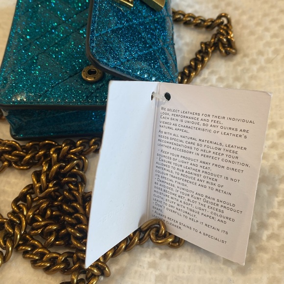 Kurt Geiger Micro Brixton Crossbody Bag TEAL Glitter
Kurt Geiger London NWT🦄 - Picture 11 of 12